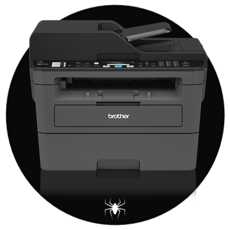 A refurbished Brother all-in-one printer sits on a dark circular surface with a small white spider icon below it.
